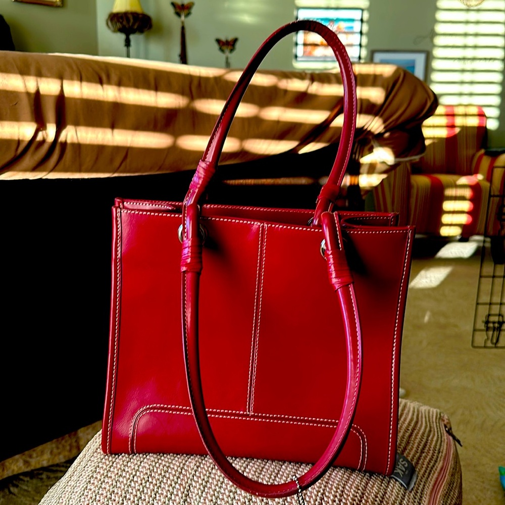 Red Leather purse with 4 compartments inside